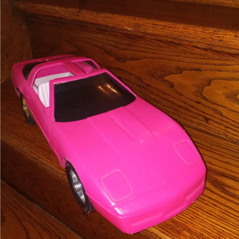 Used pink toy car